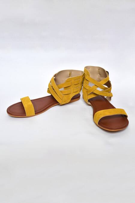 Buy_Naintara Bajaj_Yellow Plain Criss Cross Strap Effect Flats_Online_at_Aza_Fashions