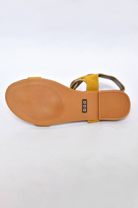 Shop_Naintara Bajaj_Yellow Plain Criss Cross Strap Effect Flats_Online_at_Aza_Fashions