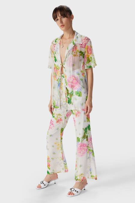 Shop The Iaso Off White Modal Embroidery Floral Print Flared Pant Online at Aza Fashions Shop_The Iaso_Off White Modal Embroidery Floral Print Flared Pant _Online_at_Aza_Fashions