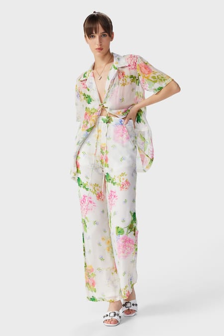 The Iaso Off White Crepe Embroidery Collared Floral Print Beach Shirt Online at Aza Fashions The Iaso_Off White Crepe Embroidery Collared Floral Print Beach Shirt _Online_at_Aza_Fashions