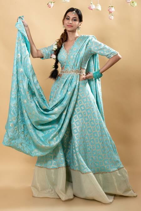 Monk & Mei By Sonia Anand Blue Brocade Embroidery V-neck Sevati Flower Blouse Sharara Set at Aza Fashions Monk & Mei By Sonia Anand_Blue Brocade Embroidery V-neck Sevati Flower Blouse Sharara Set _at_Aza_Fashions