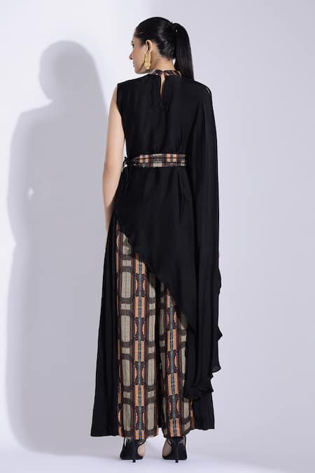 Shop Studio Surbhi Black Georgette, Satin Piping Bandeau Neck Asymmetric Top And Side Pleated Pant at Aza Fashions Shop_Studio Surbhi_Black Georgette, Satin Piping Bandeau Neck Asymmetric Top And Side Pleated Pant _at_Aza_Fashions