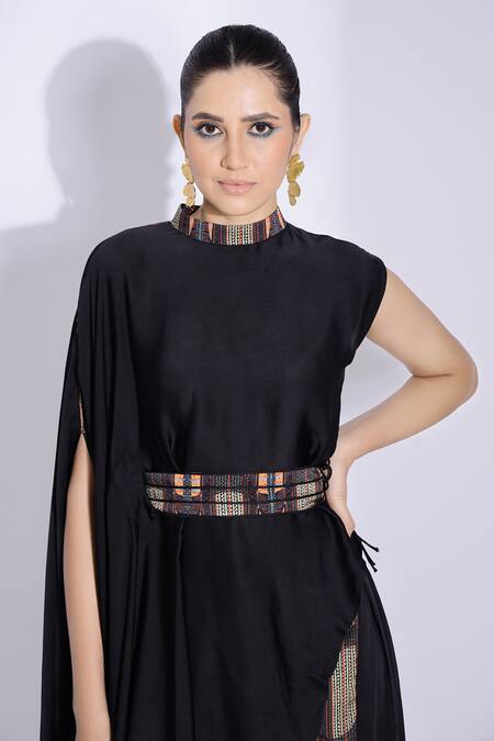 Studio Surbhi Black Georgette, Satin Piping Bandeau Neck Asymmetric Top And Side Pleated Pant at Aza Fashions Studio Surbhi_Black Georgette, Satin Piping Bandeau Neck Asymmetric Top And Side Pleated Pant _at_Aza_Fashions