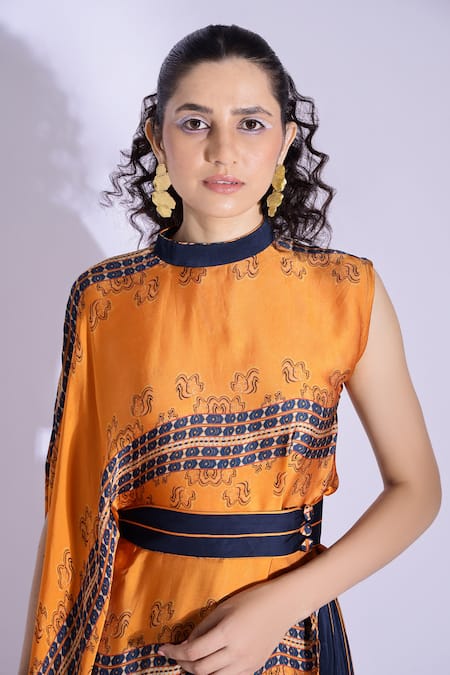 Studio Surbhi_Orange Georgette, Satin Bandeau Neck Abstract Print Asymmetric Top And Flared Pant _at_Aza_Fashions