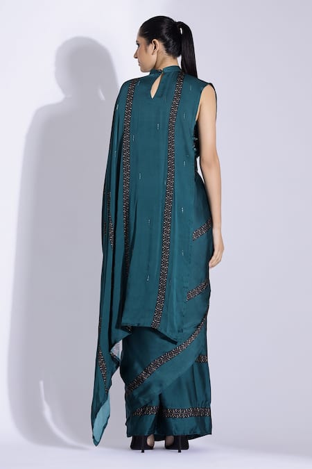 Shop Studio Surbhi Green Georgette, Satin Tassels, Pre-stitched Saree With Embellished Blouse at Aza Fashions Shop_Studio Surbhi_Green Georgette, Satin Tassels, Pre-stitched Saree With Embellished Blouse _at_Aza_Fashions