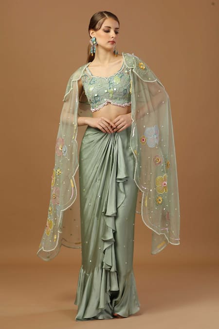 Merge Design - Women Green Blouse Net Draped Skirt Set With Floral Applique Shrug For Women| Aza Fashions| Destination Wedding