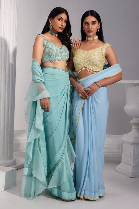 Swati Wadhwani Couture Blue Georgette, Organza, Net Sequins V-neck Pre-draped Ruffle Saree With Blouse at Aza Fashions Swati Wadhwani Couture_Blue Georgette, Organza, Net Sequins V-neck Pre-draped Ruffle Saree With Blouse _at_Aza_Fashions
