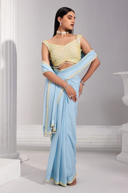 Shop Swati Wadhwani Couture Blue Georgette, Net Sequins V-neck Pre-draped Embroidered Saree With Blouse at Aza Fashions Shop_Swati Wadhwani Couture_Blue Georgette, Net Sequins V-neck Pre-draped Embroidered Saree With Blouse _at_Aza_Fashions