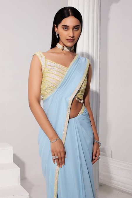 Swati Wadhwani Couture Blue Georgette, Net Sequins V-neck Pre-draped Embroidered Saree With Blouse Online at Aza Fashions Swati Wadhwani Couture_Blue Georgette, Net Sequins V-neck Pre-draped Embroidered Saree With Blouse _Online_at_Aza_Fashions
