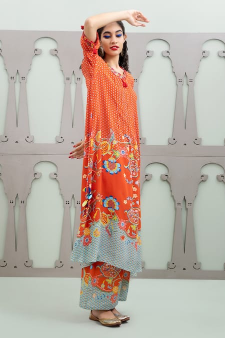 Lila Red Crepe Embroidery, Sequins Round Lalie Floral Garden Pattern Kurta With Pant at Aza Fashions Lila_Red Crepe Embroidery, Sequins Round Lalie Floral Garden Pattern Kurta With Pant_at_Aza_Fashions