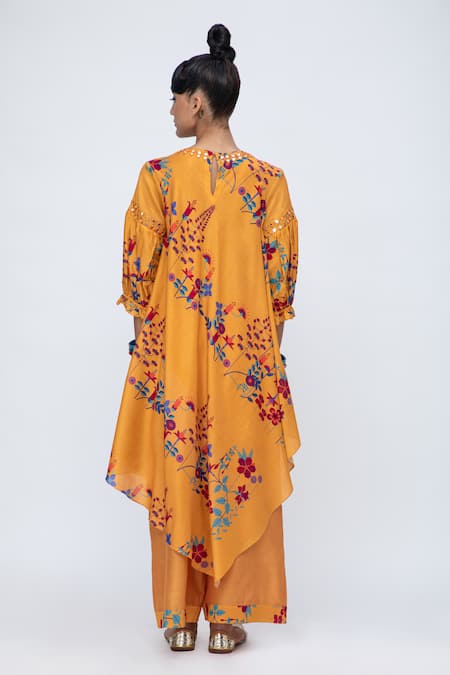Shop Lila Yellow Cotton, Silk Embroidery, Cara Floral Print Asymmetric Kurta And Pant Set at Aza Fashions Shop_Lila_Yellow Cotton, Silk Embroidery, Cara Floral Print Asymmetric Kurta And Pant Set_at_Aza_Fashions