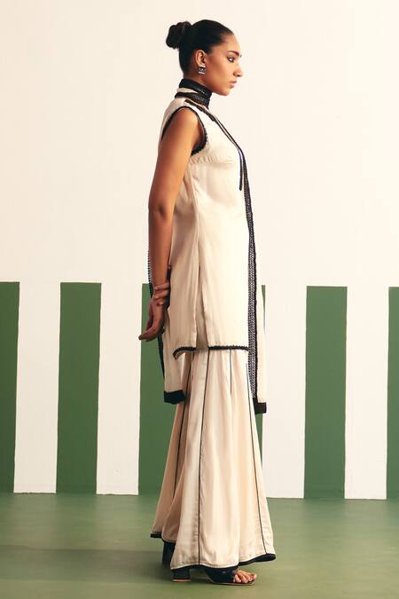 Reeti Arneja - Theklub_Ivory Cotton Satin, Organza Sequins Enora Embroidered Yoke Kurta Sharara Set _Online_at_Aza_Fashions