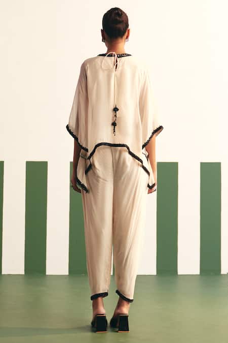 Shop Reeti Arneja - Theklub Ivory Organza Sequins Round Neck Mavis Embroidered Yoke Kaftan With Dhoti Pant at Aza Fashions Shop_Reeti Arneja - Theklub_Ivory Organza Sequins Round Neck Mavis Embroidered Yoke Kaftan With Dhoti Pant _at_Aza_Fashions