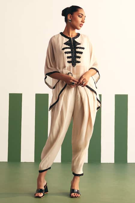 Reeti Arneja - Theklub Ivory Organza Sequins Round Neck Mavis Embroidered Yoke Kaftan With Dhoti Pant Online at Aza Fashions Reeti Arneja - Theklub_Ivory Organza Sequins Round Neck Mavis Embroidered Yoke Kaftan With Dhoti Pant _Online_at_Aza_Fashions