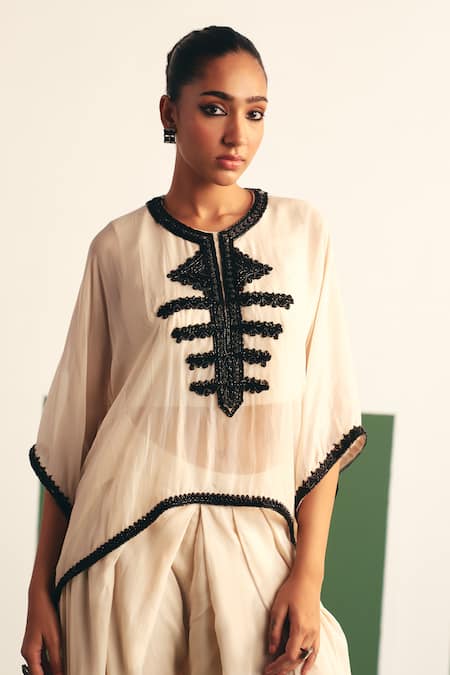 Reeti Arneja - Theklub Ivory Organza Sequins Round Neck Mavis Embroidered Yoke Kaftan With Dhoti Pant at Aza Fashions Reeti Arneja - Theklub_Ivory Organza Sequins Round Neck Mavis Embroidered Yoke Kaftan With Dhoti Pant _at_Aza_Fashions