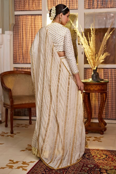 Shop Nimbu Mirchi Off White Chanderi Sequins V-neck Butti Embroidered Lehenga Blouse Set at Aza Fashions Shop_Nimbu Mirchi_Off White Chanderi Sequins V-neck Butti Embroidered Lehenga Blouse Set_at_Aza_Fashions