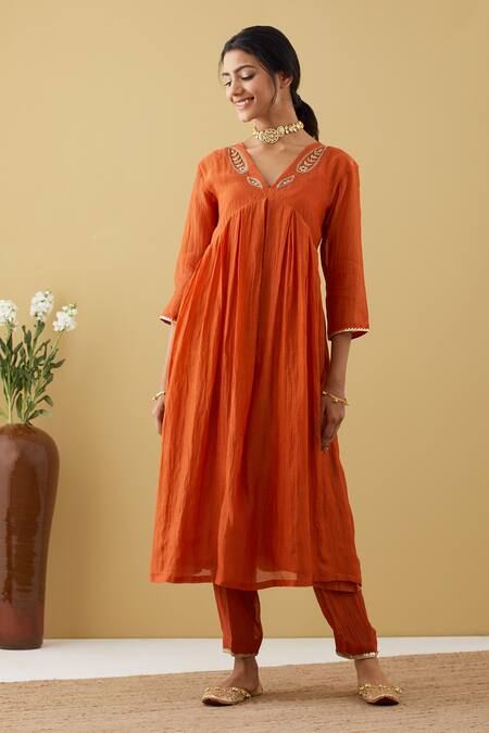 Tashee Orange Chanderi Sequins, Beads, Zari V-neck Gathered Kurta Pant Set Online at Aza Fashions Tashee_Orange Chanderi Sequins, Beads, Zari V-neck Gathered Kurta Pant Set _Online_at_Aza_Fashions