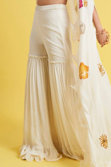 Buy_Surily G_Ivory Georgette Plain Ruffle Bordered Flared Sharara  _Online_at_Aza_Fashions