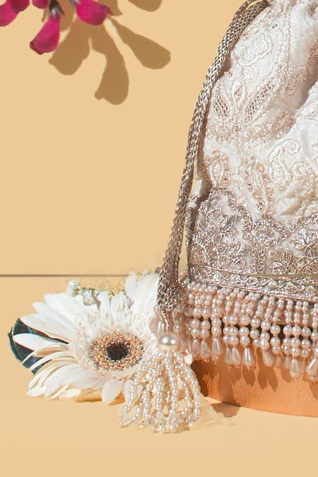 Amyra_Off White Lace, Pearls, Embroidery Chaand Bucket Bag_Online_at_Aza_Fashions