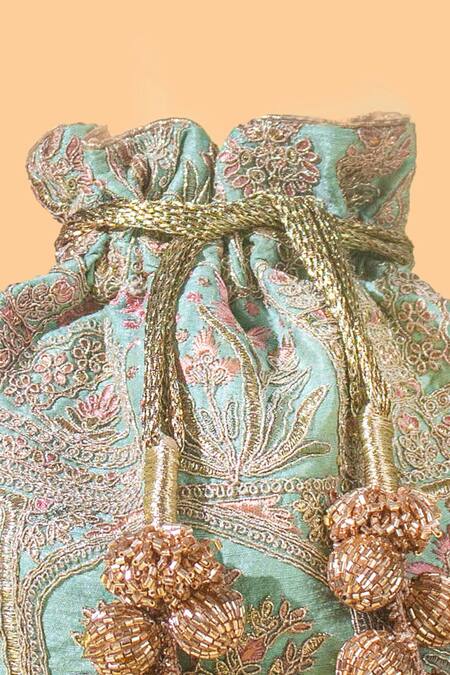Shop_Amyra_Blue Cut Work, Embroidery Amer Potlli Bag_Online_at_Aza_Fashions