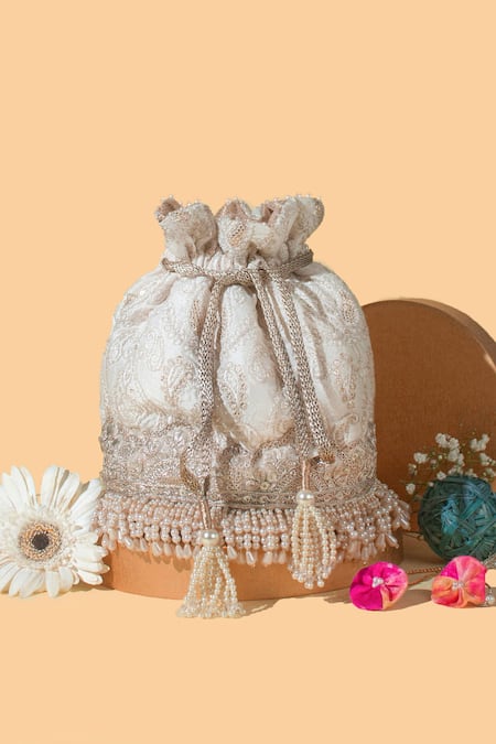 Floral creeper cream potli – AMYRA | Handcrafted bags, Potli bags, Handcraft