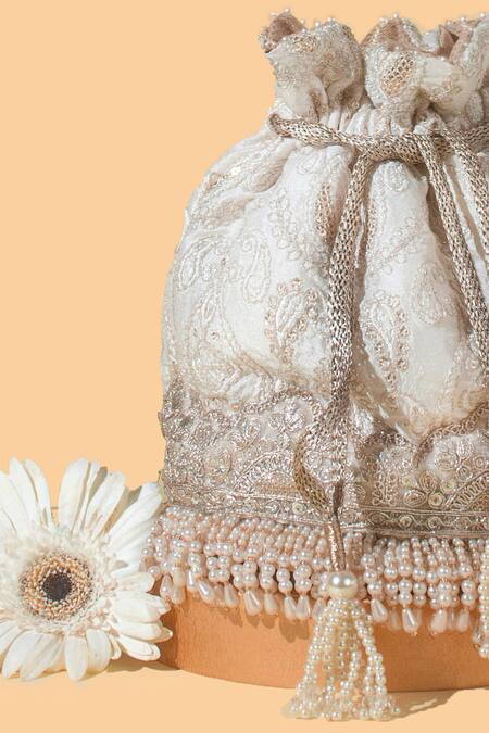 Shop_Amyra_Off White Pearls, Crystals, Embroidery Chaand Potli Bag_Online_at_Aza_Fashions