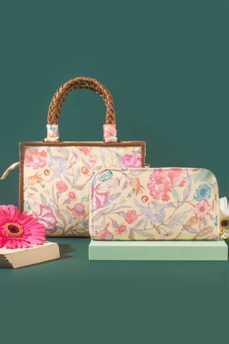 Shop Amyra Yellow Aloha Floral Print Handbag at Aza Fashions Shop_Amyra_Yellow Aloha Floral Print Handbag_at_Aza_Fashions