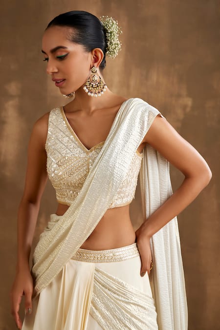 Shop Niamh By Kriti Ivory Silk, Crepe Sequins, Cut Work One Attached Draped Lehenga With Blouse Online at Aza Fashions Shop_Niamh By Kriti_Ivory Silk, Crepe Sequins, Cut Work One Attached Draped Lehenga With Blouse _Online_at_Aza_Fashions