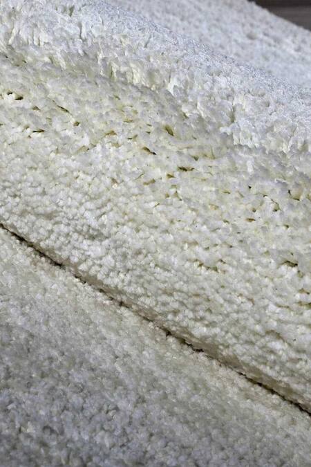 Shop_Kaleen India_White 100% Polyester Hand Tufted Daisy Oval Rug_Online_at_Aza_Fashions