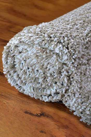 Kaleen India Beige 100% Polyester Hand Tufted Daisy Round Shaped Rug Online at Aza Fashions Kaleen India_Beige 100% Polyester Hand Tufted Daisy Round Shaped Rug_Online_at_Aza_Fashions