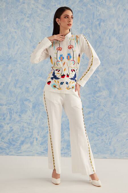Shop Fuga White Linen Embroidery Collared Floral Top With Bell Bottom Pant at Aza Fashions Shop_Fuga_White Linen Embroidery Collared Floral Top With Bell Bottom Pant_at_Aza_Fashions