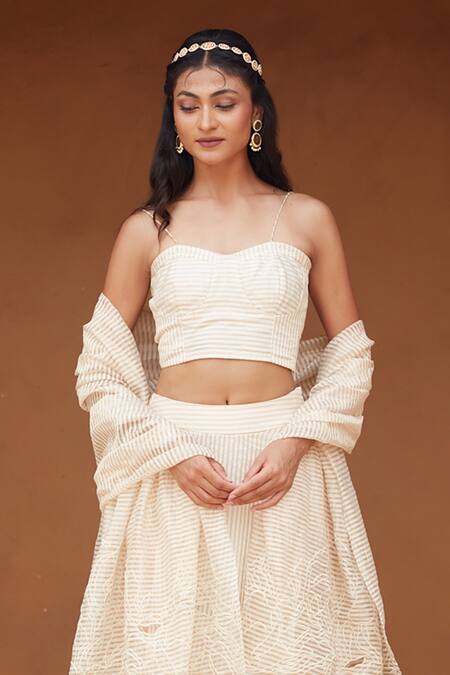 Shop Chambray & CO. Ivory Handloom Cotton Cut Work Isra Stripe Pattern Bustier Lehenga Set Online at Aza Fashions Shop_Chambray & CO._Ivory Handloom Cotton Cut Work Isra Stripe Pattern Bustier Lehenga Set _Online_at_Aza_Fashions