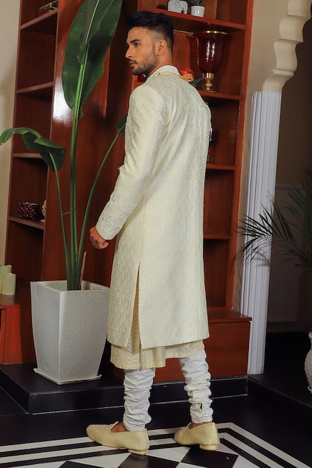 Shop Yajy By Aditya Jain Ivory Silk, Cotton Sequins, Embroidery Paisley And Floral Sherwani Set at Aza Fashions Shop_Yajy By Aditya Jain_Ivory Silk, Cotton Sequins, Embroidery Paisley And Floral Sherwani Set _at_Aza_Fashions