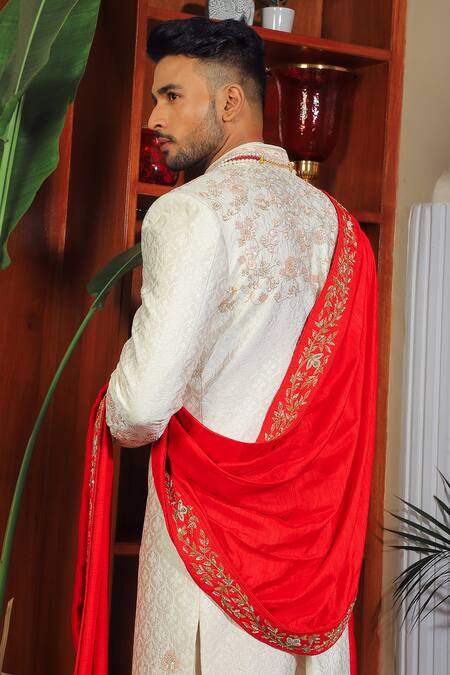 Yajy By Aditya Jain Ivory Silk, Cotton Sequins, Embroidery Paisley And Floral Sherwani Set at Aza Fashions Yajy By Aditya Jain_Ivory Silk, Cotton Sequins, Embroidery Paisley And Floral Sherwani Set _at_Aza_Fashions