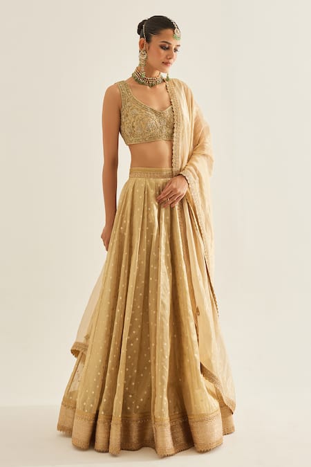 Shop Shyam Narayan Prasad Gold Tissue Embroidery, Zari V-neck Floral Woven Pattern Lehenga Set at Aza Fashions Shop_Shyam Narayan Prasad_Gold Tissue Embroidery, Zari V-neck Floral Woven Pattern Lehenga Set _at_Aza_Fashions