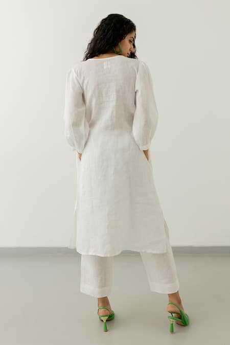 Shop Silai Studio White Linen Embroidery Round Neck Bloom Yoke Kurta at Aza Fashions Shop_Silai Studio_White Linen Embroidery Round Neck Bloom Yoke Kurta _at_Aza_Fashions