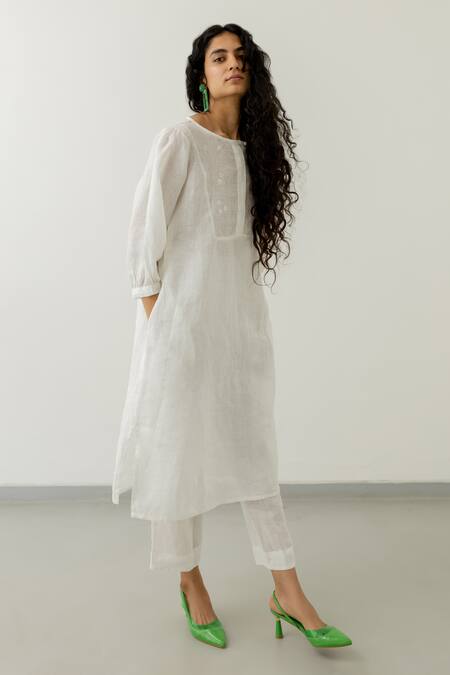Shop Silai Studio White Linen Embroidery Round Neck Bloom Yoke Kurta Online at Aza Fashions Shop_Silai Studio_White Linen Embroidery Round Neck Bloom Yoke Kurta _Online_at_Aza_Fashions