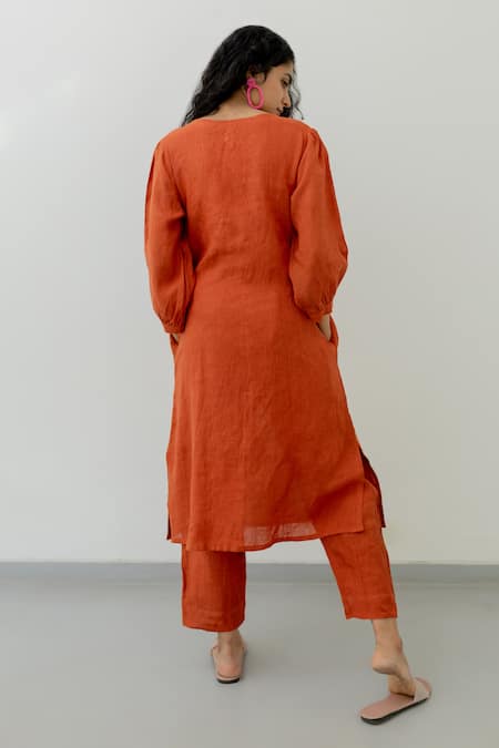 Shop Silai Studio Orange Linen Sequins Boat Neck Yoke Embroidered Kurta at Aza Fashions Shop_Silai Studio_Orange Linen Sequins Boat Neck Yoke Embroidered Kurta _at_Aza_Fashions