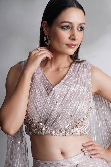 Chaashni By Maansi And Ketan_Beige Net, Silk Sequins, Cut Work V-neck Embroidered Blouse And Lehenga Set _Online_at_Aza_Fashions