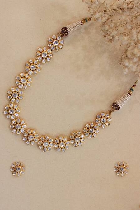 Shop_Zeeya Luxury Jewellery_Gold Plated Imitation Diamonds Flower Bloom Embellished Jewellery Set_at_Aza_Fashions