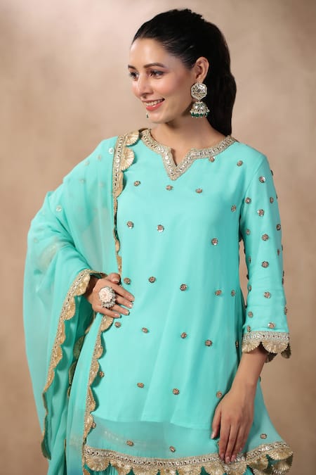 Palak Khandelwal_Blue Georgette Sequins, Pearls Keyhole Neck Embroidered Short Kurta Sharara Set _at_Aza_Fashions
