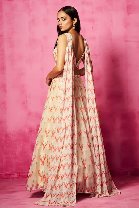 Neha Gursahani Ivory Georgette Zari, Embroidery V-neck Abstract Print Blouse Lehenga Set at Aza Fashions Neha Gursahani_Ivory Georgette Zari, Embroidery V-neck Abstract Print Blouse Lehenga Set _at_Aza_Fashions