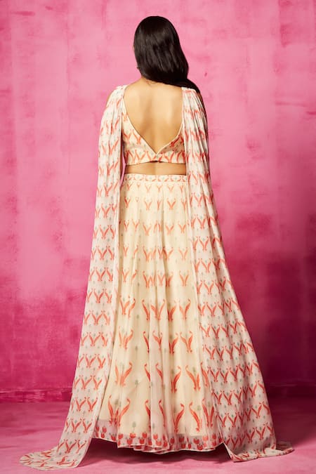 Shop Neha Gursahani Ivory Georgette Zari, Embroidery V-neck Abstract Print Blouse Lehenga Set at Aza Fashions Shop_Neha Gursahani_Ivory Georgette Zari, Embroidery V-neck Abstract Print Blouse Lehenga Set _at_Aza_Fashions