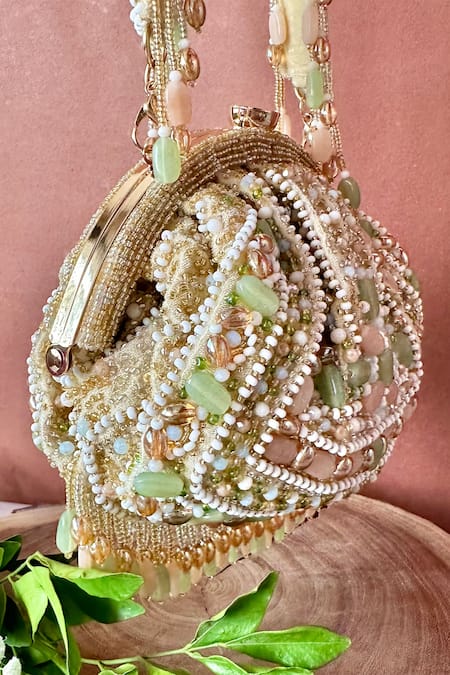 Shop Nayaab By Sonia Ivory Crystals, Beads Rani Embellished Potli Bag at Aza Fashions Shop_Nayaab By Sonia_Ivory Crystals, Beads Rani Embellished Potli Bag _at_Aza_Fashions