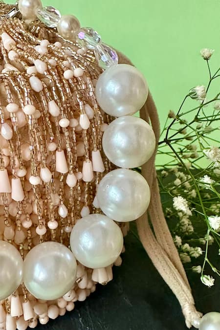 Nayaab By Sonia Pink Embroidery Frost Tassel Embellished Bucket Bag Online at Aza Fashions Nayaab By Sonia_Pink Embroidery Frost Tassel Embellished Bucket Bag _Online_at_Aza_Fashions