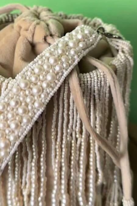 Buy_Nayaab By Sonia_Off White Pearls Gilt Cascade Tassel Embellished Potli _Online_at_Aza_Fashions