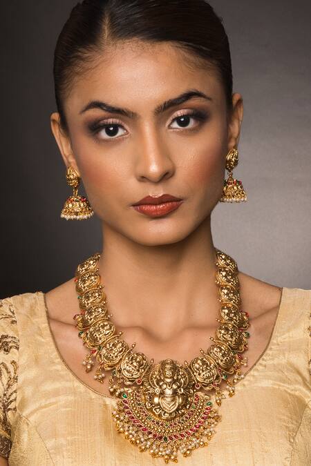 Shop Queens Jewels Gold Plated Stones, Beads Aabha Lakshmi Carved Temple Pendant Necklace Set at Aza Fashions Shop_Queens Jewels_Gold Plated Stones, Beads Aabha Lakshmi Carved Temple Pendant Necklace Set_at_Aza_Fashions