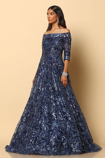 Meenagurnam_Blue Net Sequins Off-shoulder Midnight Bloom Embellished Gown _at_Aza_Fashions