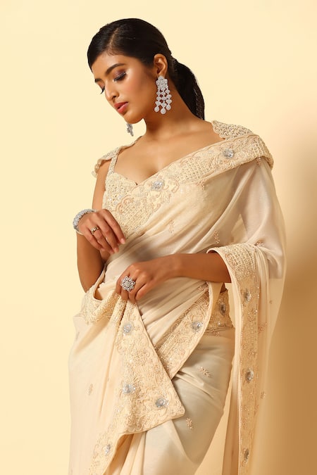 Shop Meenagurnam Ivory Shimmer Chinnon Embroidery Tonal Floral Beaded Border Saree With Blouse Online at Aza Fashions Shop_Meenagurnam_Ivory Shimmer Chinnon Embroidery Tonal Floral Beaded Border Saree With Blouse _Online_at_Aza_Fashions