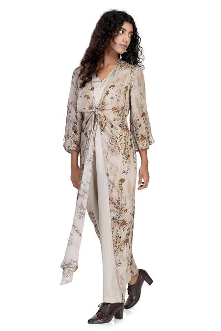 Buy_Whimsical By Shica_Ivory Organza, Satin V-neck Flora Print Front Tie-up Jumpsuit _Online_at_Aza_Fashions